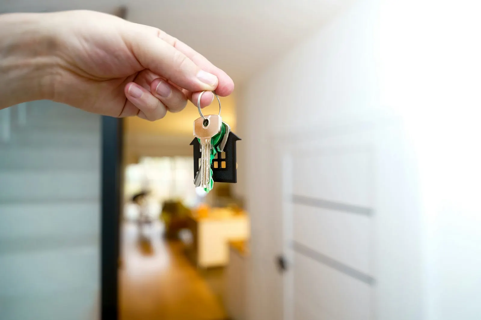 Owner handing keys to a tenant