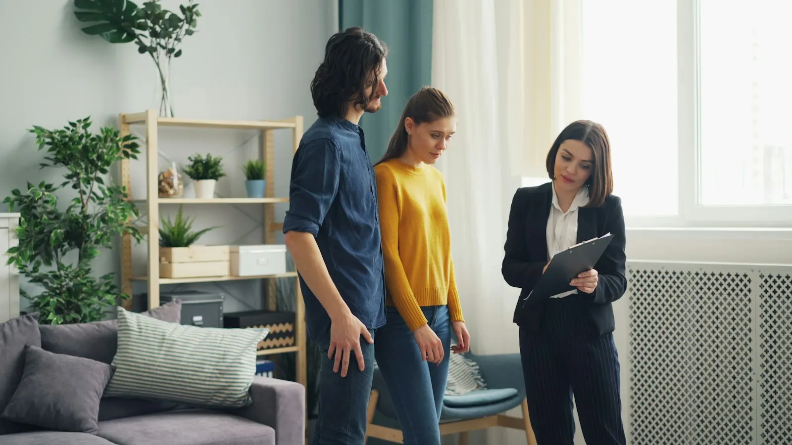 A KejaVu verifier showing a couple around an apartment